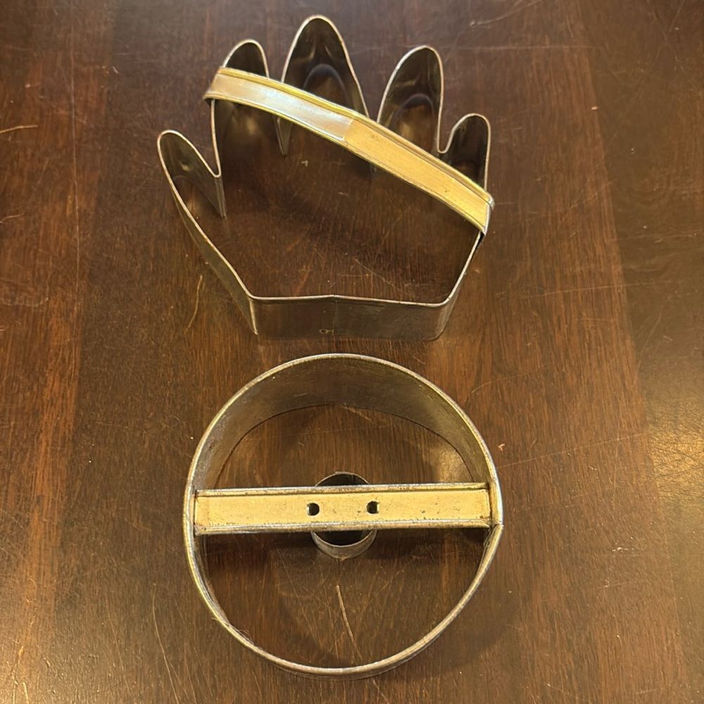 Vintage cookie cutters, hand and donut